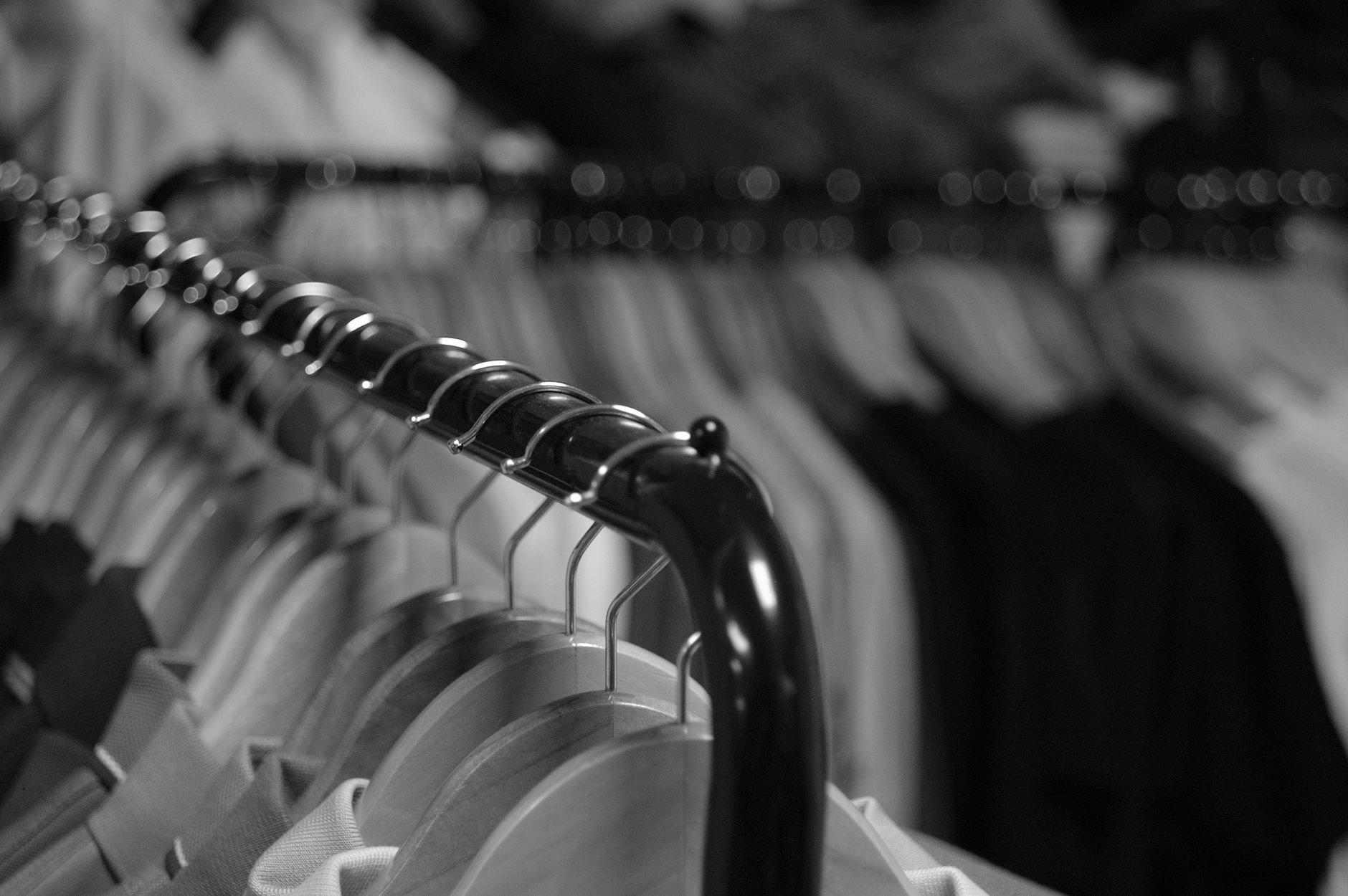 Garments arranged on a clothing rail; representative garment-care photography, not the Linden Cleaners shop